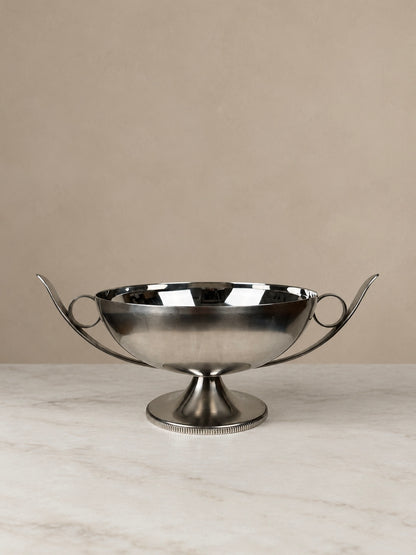 French stainless steel pedestal bowl by Bouillet & Bourdelle with sweeping curved handles, circular detailing and a reeded pedestal base.