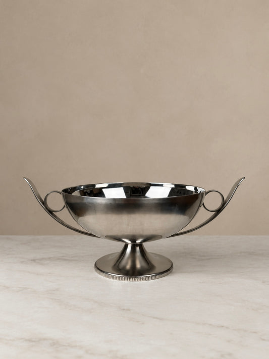 French stainless steel pedestal bowl by Bouillet & Bourdelle with sweeping curved handles, circular detailing and a reeded pedestal base.