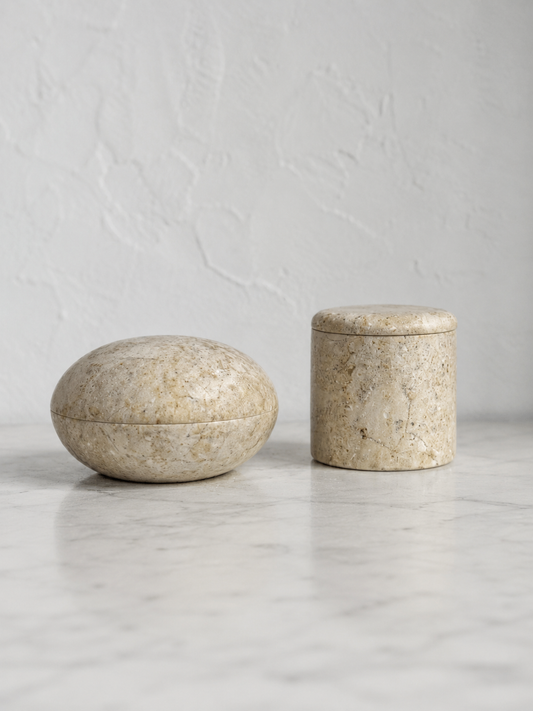Set of two cream marble trinket boxes