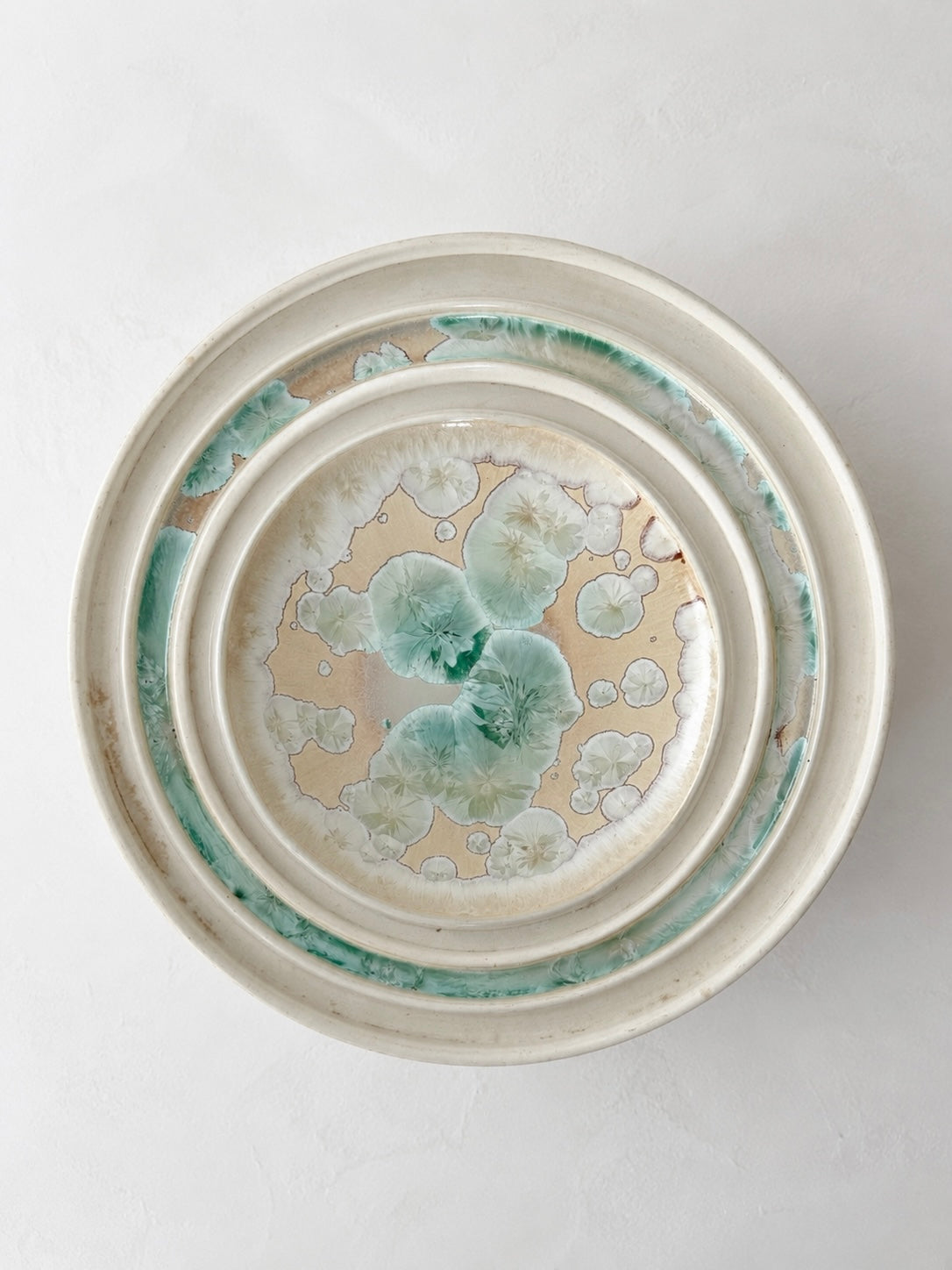 Signed Stephen R. Jones micro-crystalline ceramic bowl with pale turquoise crystalline glaze