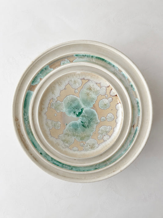 Signed Stephen R. Jones micro-crystalline ceramic bowl with pale turquoise crystalline glaze