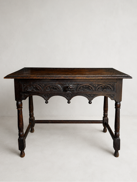 Antique Victorian oak Green Man side table with Gothic Revival carving and turned legs