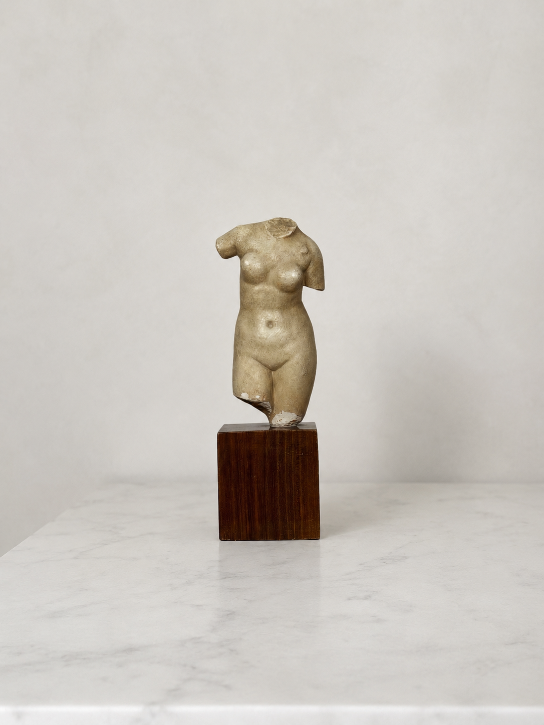 Mid-century female torso sculpture on wood plinth