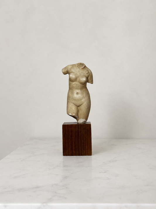 Mid-century female torso sculpture on wood plinth