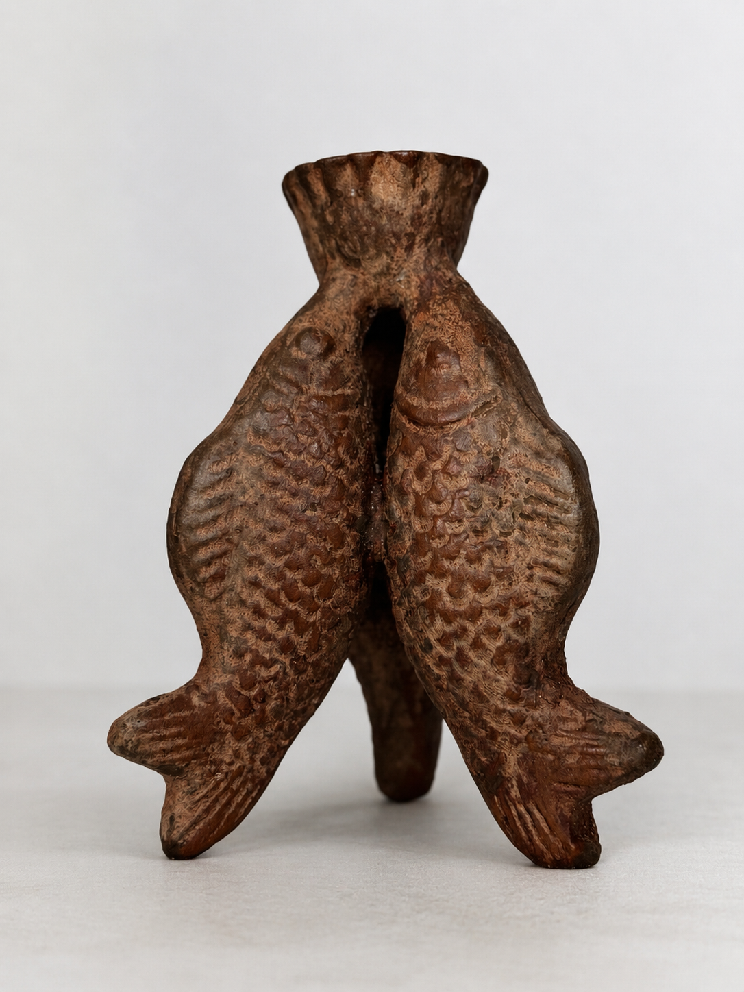 Terracotta three fish candle holder
