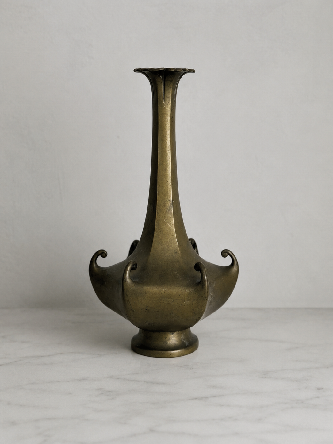 Antique Japanese bronze vase with scrolling handles