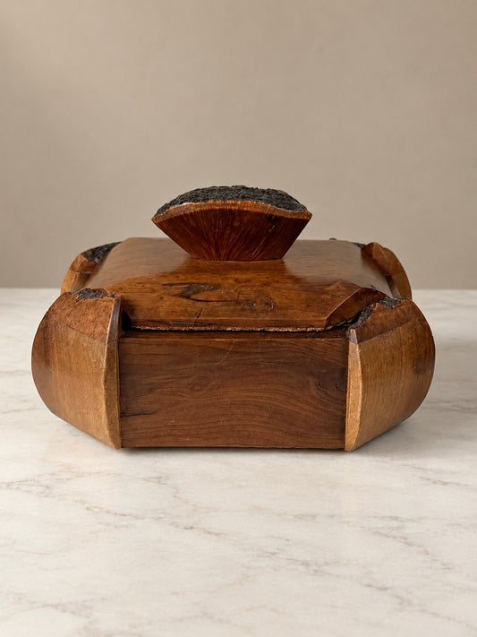 French Art Deco wooden lidded box marked PEHEM Déposé, featuring curved sculptural corners, dark carved details and a removable rectangular lid.